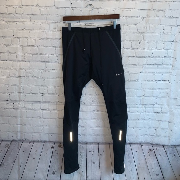 Nike Pants - Nike Dri Fit Black w Zippers tight pants size M